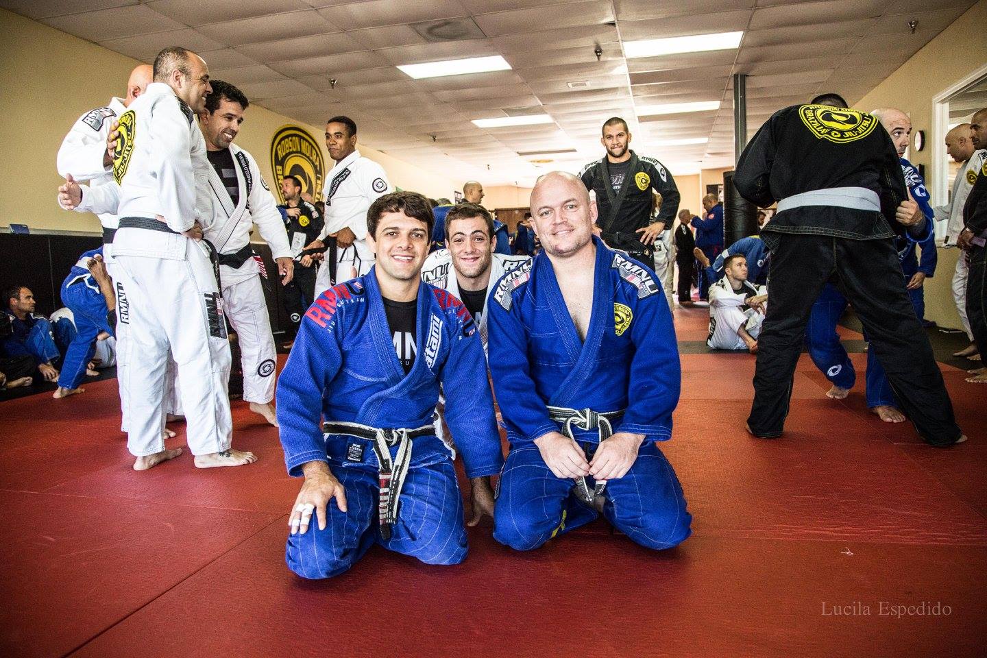 The crew together on the mats